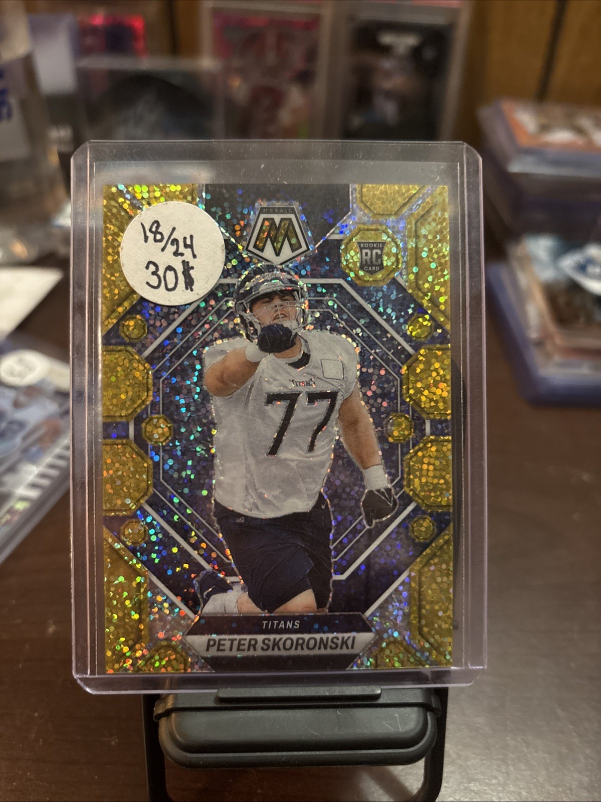 2023 Panini Mosaic - Rookies Peter Skoronski #355 Gold Sparkle Prizm /24 (RC)