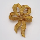 Vintage Trifari Gold Tone Bow Ribbon Brooch Pin Textured Beaded Costume Jewelry