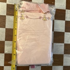 Pair of Pink Vintage Plastic Luvs Deluxe With Sesame Street