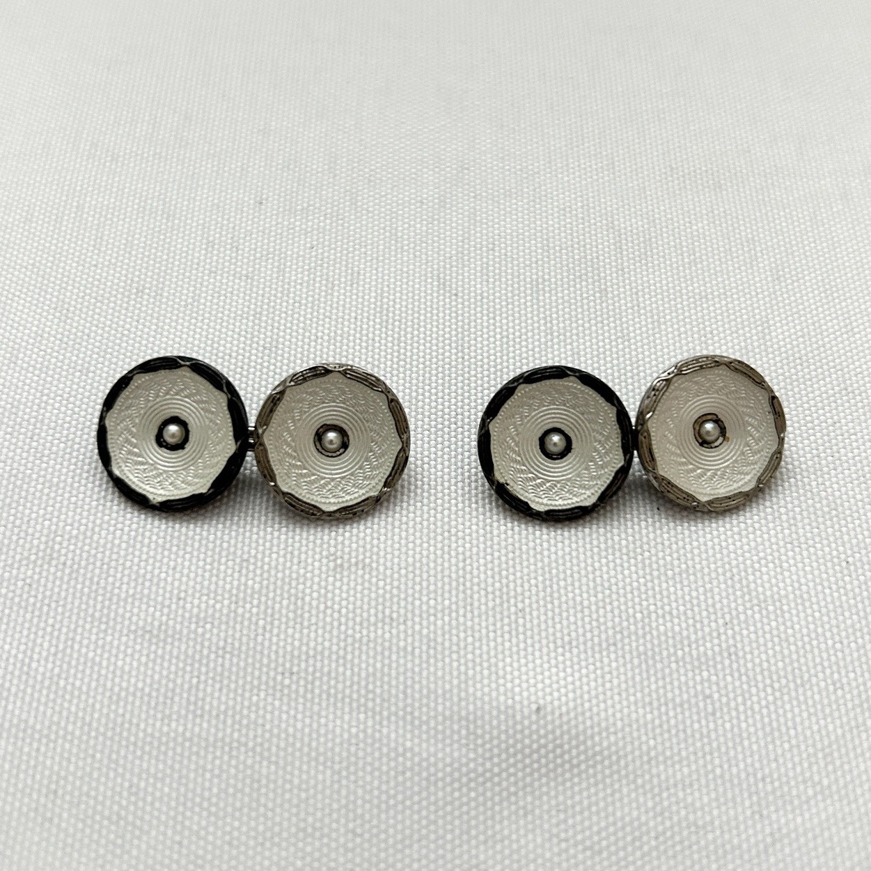 Double-sided Art Deco guilloche enamel cufflinks with seed pearl accents, 1930s