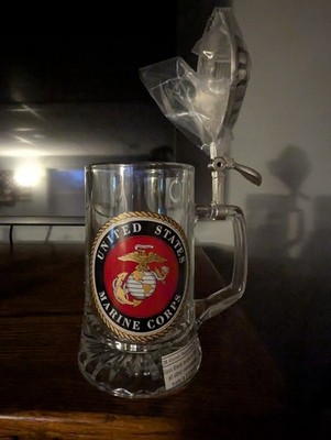 M. Cornell Importers glass beer stein with a Marine emblem