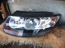 Faro proiettore anteriore vicino lato passeggero Hyundai Santa Fe 2007 - sinistro
