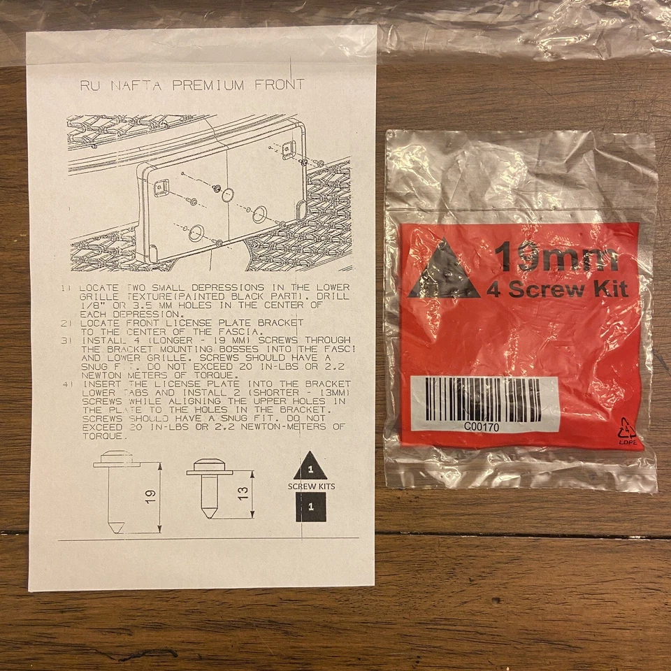 Chrysler Pacifica 2021 matrícula parachoques delantero marco soporte de plástico Foto 4 de 4