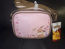 NWT Pink Pok mon Eevee Floral Camera Crossbody Bag