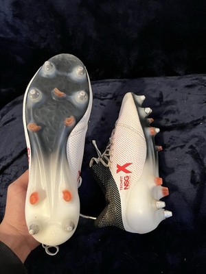 Adidas X Speedflow. 1 FG football boots in white and orange