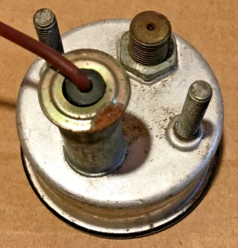 TWO AUTOMOBILE GAUGES & ORIGINAL HEADLIGHT & SIDELIGHT BULB HOLDER