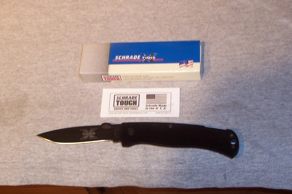 CUCHILLO TRASERO SCHRADE X TIMER 60TXB BLOQUEO NUEVO EN CAJA HOJA NEGRA MANGO NEGRO HECHO EN EE. UU. Foto 2 de 4