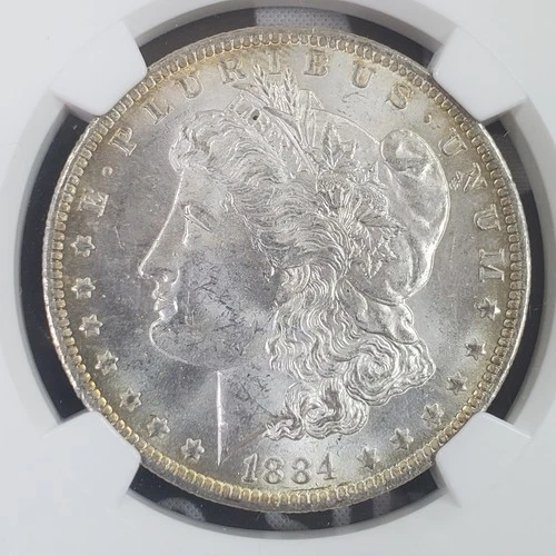 *Light Toning* 1884-O $1 Morgan Silver Dollar - NGC Graded MS 63 -041