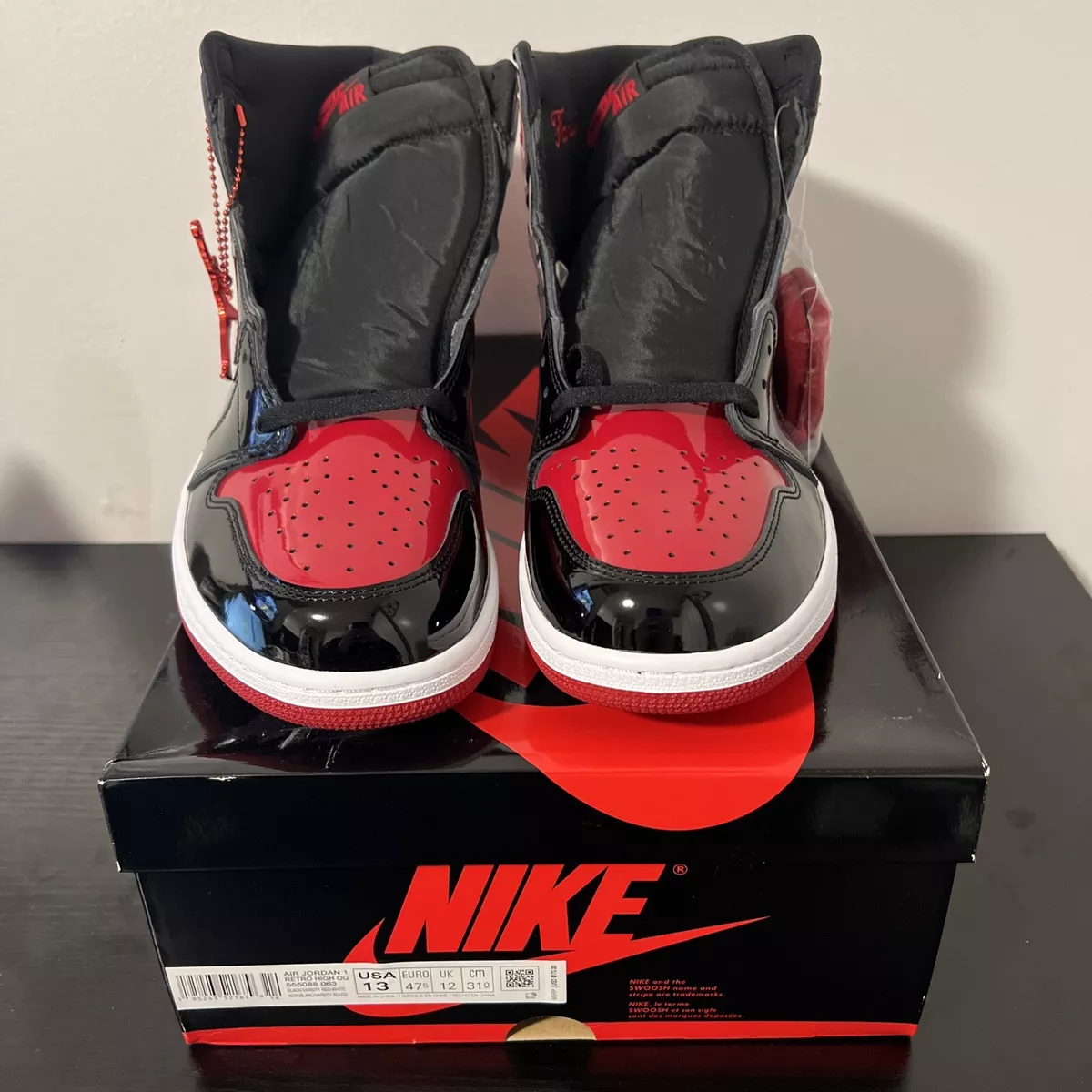 Jordan 1 black outlet with red stripe