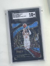 2023-24 Select Prizm Courtside Light Blue Disco #243 Trae Young /99 Hawks SGC 10