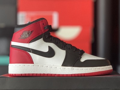 jordan 1 low black toe grade school