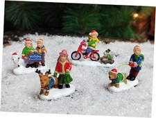  Set of 4 Hand-Painted Polyresin Christmas Village Figures 69