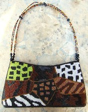FULLY BEADED PURSE WITH BEADED HANDLE  Measures 5" x 10"  NEW WITHOUT TAGS