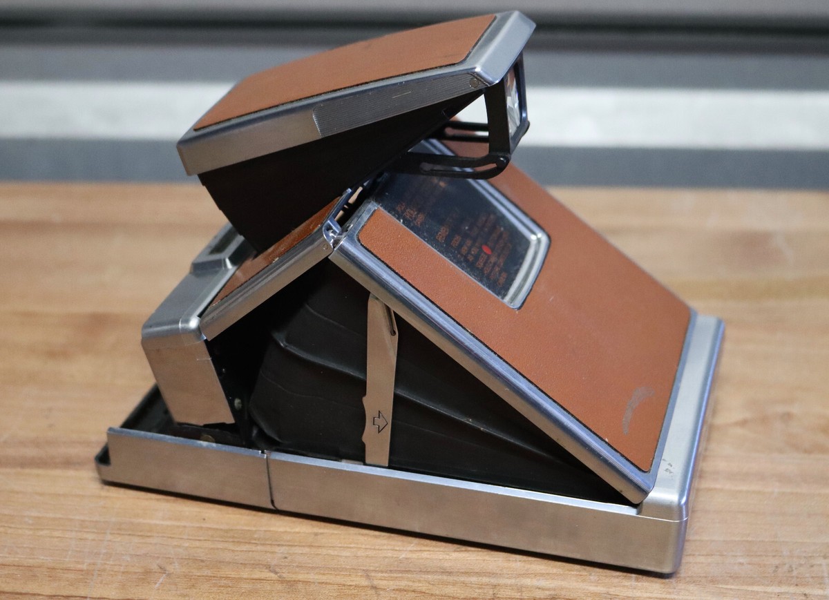 Vintage Polaroid SX-70 Land Camera Brown Leather Folding Vintage Polaroid SX-70 Land Camera Brown Leather Folding