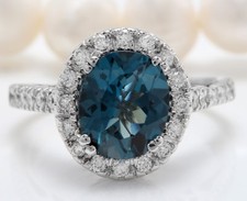 6.60 Carat Natural London Blue Topaz and Diamonds in 14K Solid White Gold Ring
