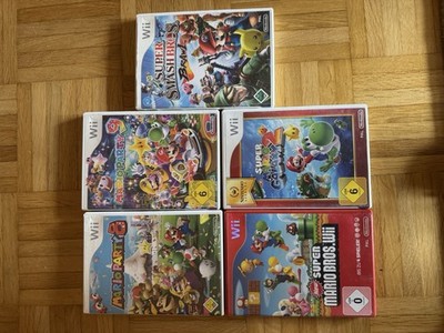 Nintendo Wii Bundle Super Smash Bros Brawl + Mario Galaxy 1 + 2 + Party 8 + 9