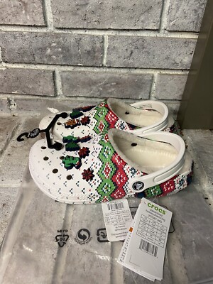 These are Crocs Classic Lined Holiday Charm Clogs featuring red and green colors Crocs Classic Lined Holiday Charm Clog Christmas White Red  main image 3