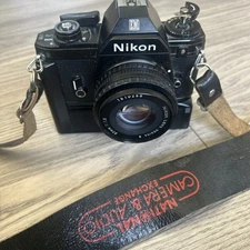 NIKON EM 35mm SLR FILM CAMERA + 50mm 1.8 LENS & NIKON MD-E MOTOR DRIVE