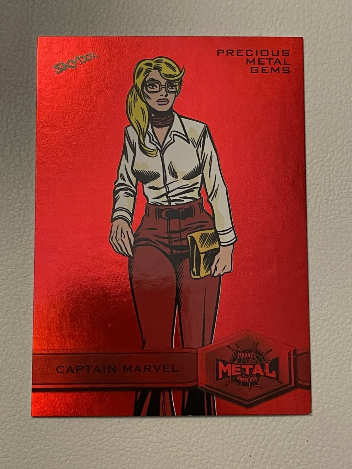 2022 Metal Universe Spider-Man High Series PMG Red 58/100 Captain Marvel #117