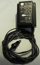 Genuine OEM Sharp EA-21A AC Adaptor Charger In 120V AC 60Hz 6W Out 8.2V DC 350mA