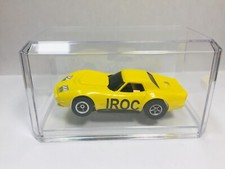 AFX tras Yellow IROC CORVETTE Auto World Chassis Display case Aurora NEW