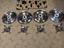 1956 Mercury Hubcaps With Accessory 4 Bar Flipper 1956 Mercury Hubcaps With Accessory 4 Bar Flipper
