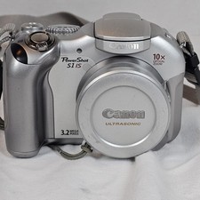 Canon Power Shot S1 IS Silver 3.2 MP Dig Camera 10x Optical PC1058 Used Working
