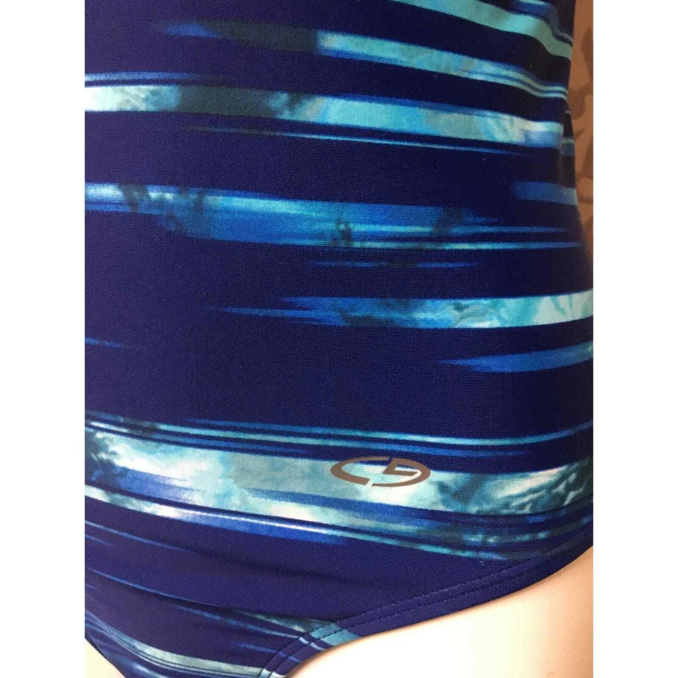 Traje de baño Champion azul y blanco patrón de salpicaduras de pintura malla espalda deportiva Foto 2 de 4