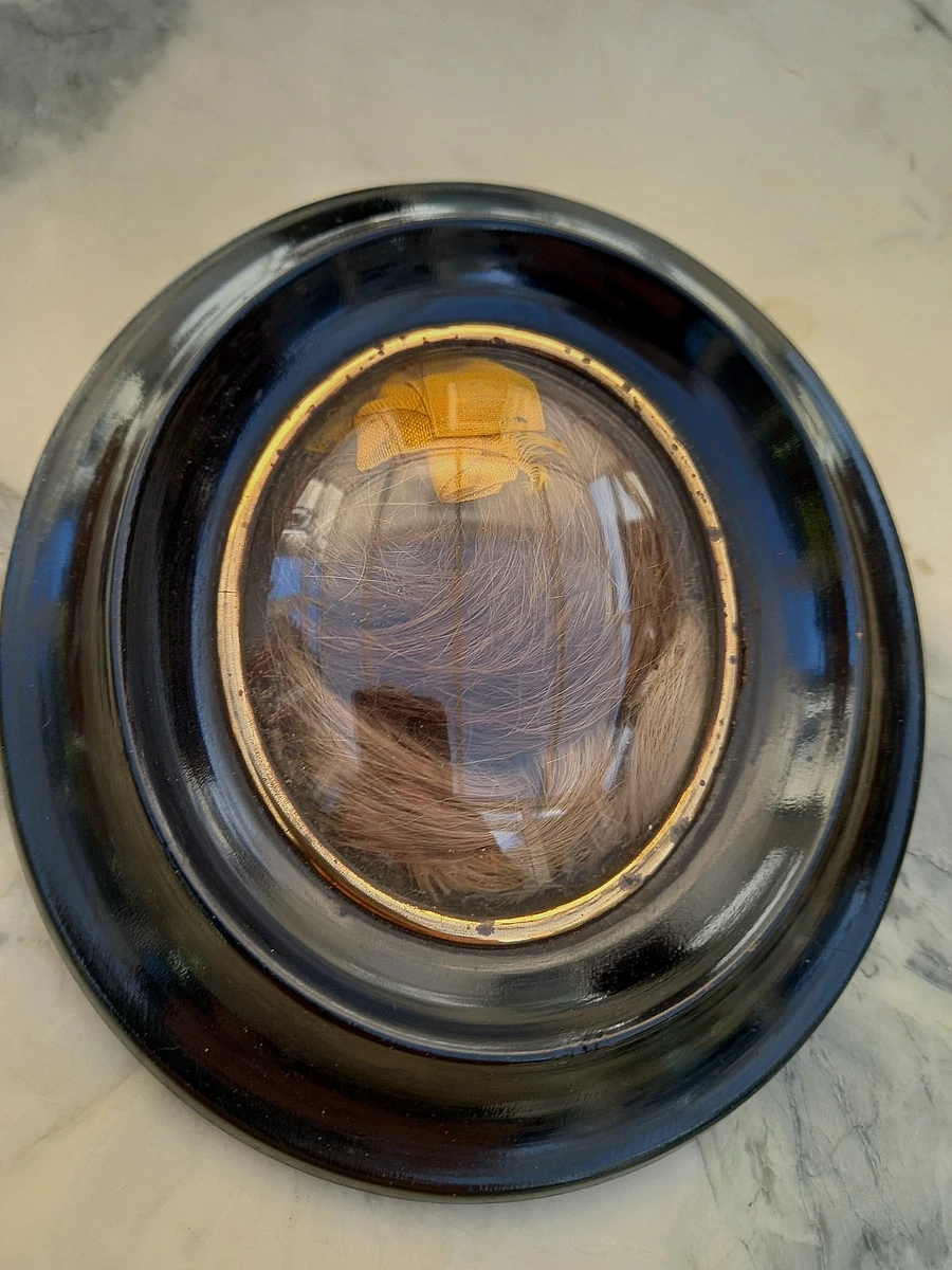 Ce cadre en verre bombé de chez mamie vaut une fortune