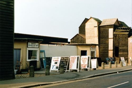 PHOTO  HASTINGS 1989 FISHMONGERS AND NET DRYING SHEDS - Picture 1 of 1