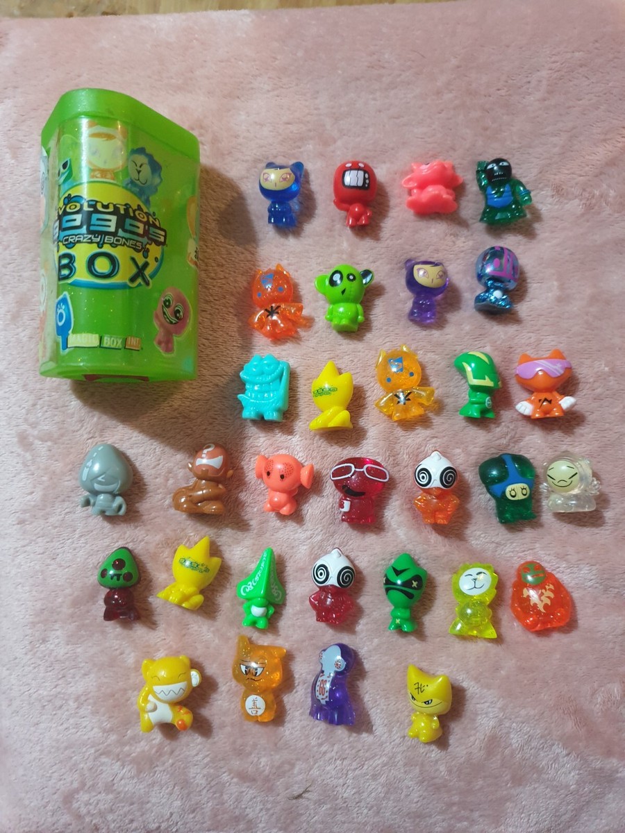 GoGo crazy bones assortment of various figures -31 plus storage