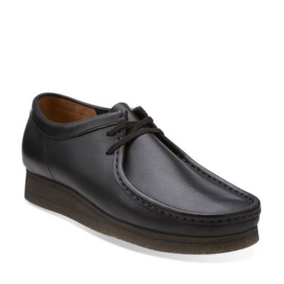 black wallabee shoes
