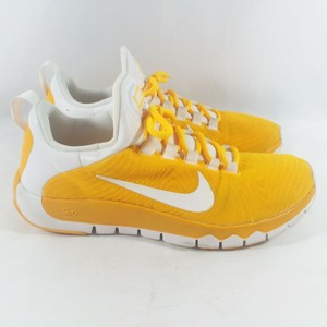 yellow nike training shoes