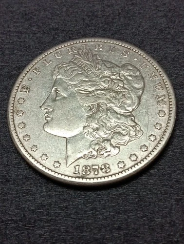 1878-CC Morgan Dollar Near Uncirculated,  Guaranteed Genuine.
