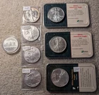 Bullion: (7) American Eagles & (1) Austrian Philharmonic (BU Silver 1 oz)