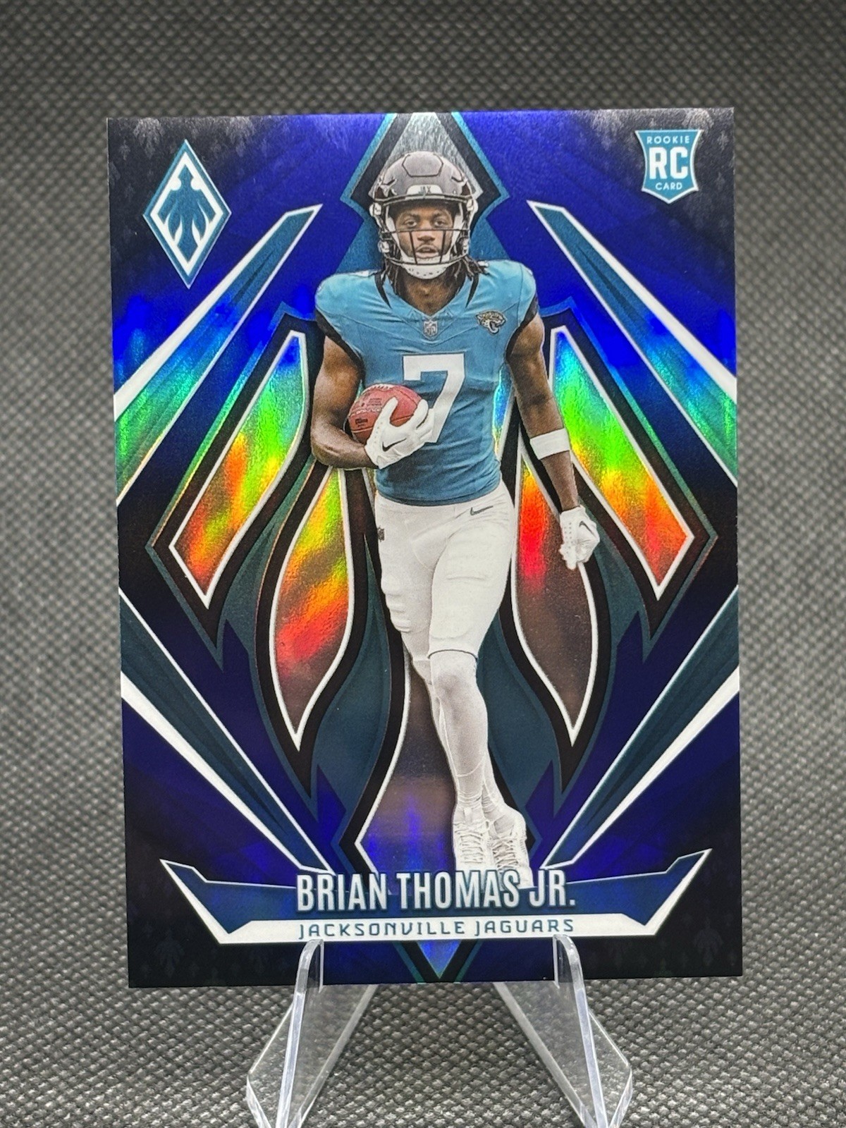 2024 Panini Phoenix - Rookies Brian Thomas Jr. #164 Blue Fade /249 (RC)