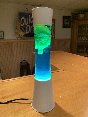 Motion Lava Lamp 15 1/2  TianHua Lava Neon Green Blue liquid base, And Top 2011