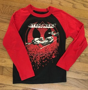 black shirt with red sleeves