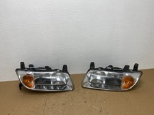 2000 To 2002 Saturn L Series Leftright Set Halogen Headlights Tyc Ab6965 Dw