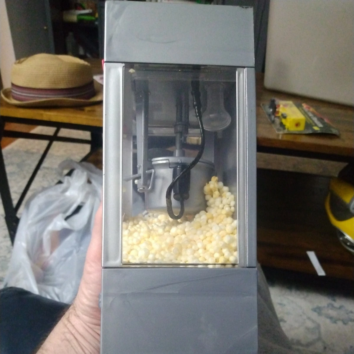 Battery operated toy popcorn machine 9 in high. Movie time