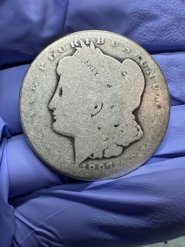 1897 SILVER MORGAN DOLLAR 0.9 FINENESS SILVER .77 PURE SILVER TROY OZ F054