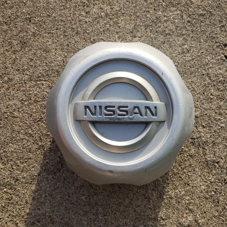 1 calota central de roda Nissan Xterra Frontier 00 01 02 2003 2004 40315-1Z800 - Imagem 2 de 4