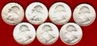 Seven 1964 silver Washington quarters