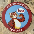 VINTAGE 1962 ESSO GAS PUT A TIGER IN YOUR TANK 12 INCH PORCELAIN ENAMEL SIGN