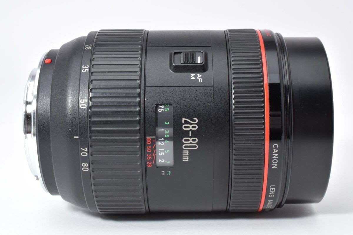 Canon EF 28-80mm F2.8-4 L USM Lens, with rear cap, front cap, and