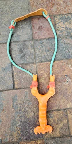 VINTAGE 1970's RARE BATMAN SLINGSHOT MEXICO ORANGE BOOTLEG TOY