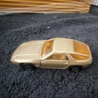 Matchbox Superfast No. 59 Porsche 928 1-75 Gold Diecast Car w/ Box