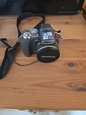 Olympus Model SP-560UZ Digital Camera read description