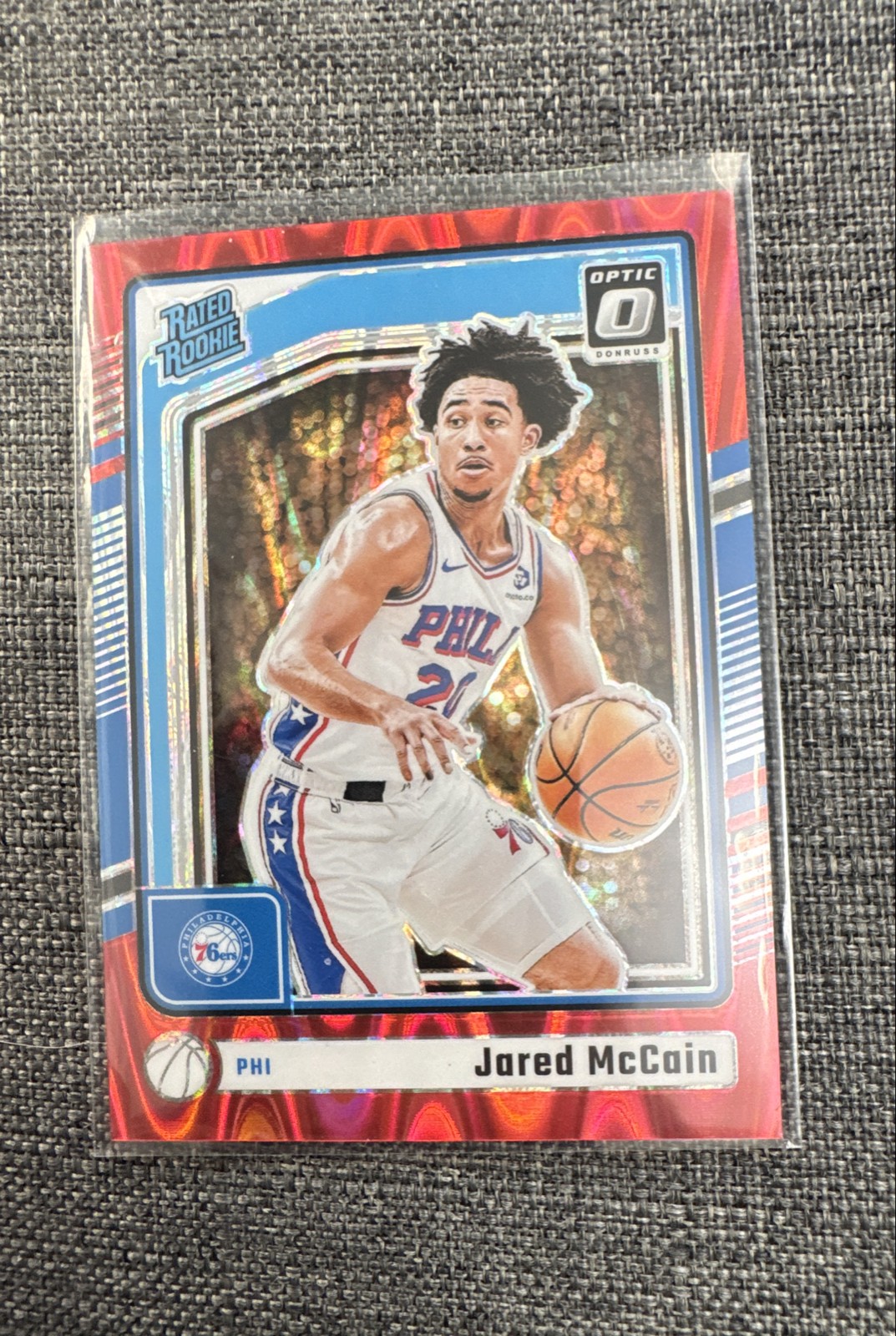 2024-25 Panini Optic - Rated Rookie Jared McCain #270 Red Seismic Prizm /149