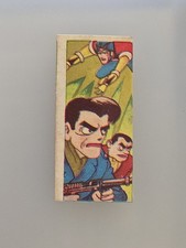 Showa Japanese Flying Figure and Rifle Scene Menko Card
